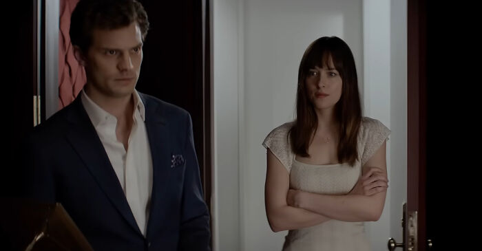 Two miscast actors in a tense movie scene, highlighting the impact of miscast actors on film reception.