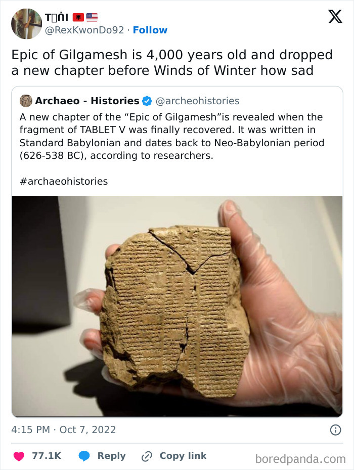 Ancient tablet fragment of the Epic of Gilgamesh held in hand, related to history class entertaining memes.