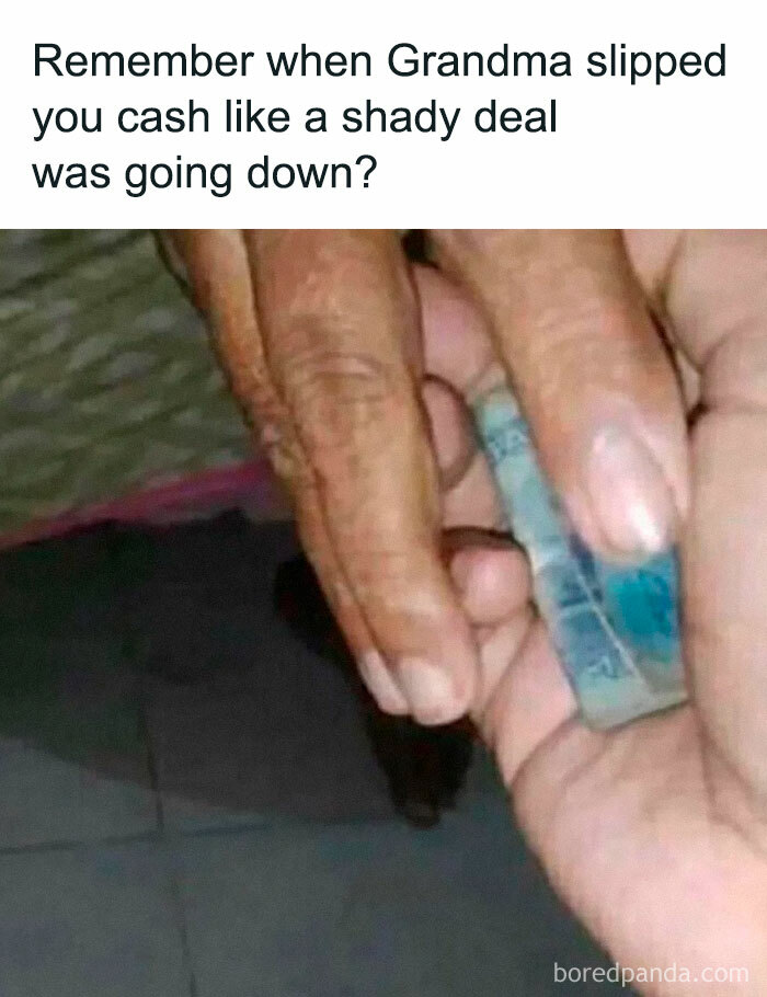 Hand passing folded cash in a nostalgic moment, celebrating the good old ‘80s with memories of secret cash exchanges.