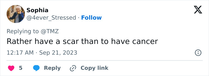 User tweet commenting on scars and cancer in response to a discussion about plastic surgery and stitched wounds. User tweet commenting on scars and cancer in response to a discussion about plastic surgery and stitched wounds.