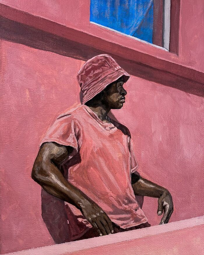 Painting of a person wearing a pink bucket hat and shirt, exploring colours, space, and identity against a pink wall background.