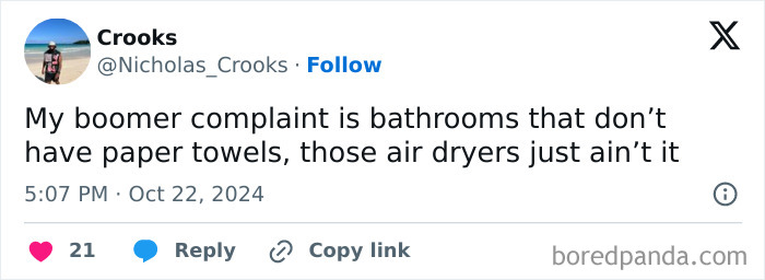 Tweet about a boomer complaint on bathrooms missing paper towels and relying on air dryers, highlighting generational differences.