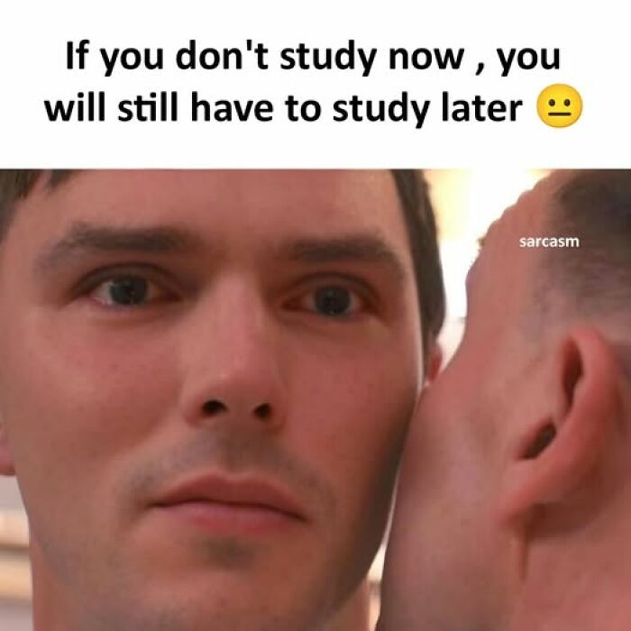 Close-up of two men with one whispering a funny meme about studying later, highlighting hilarious memes on a Facebook page.