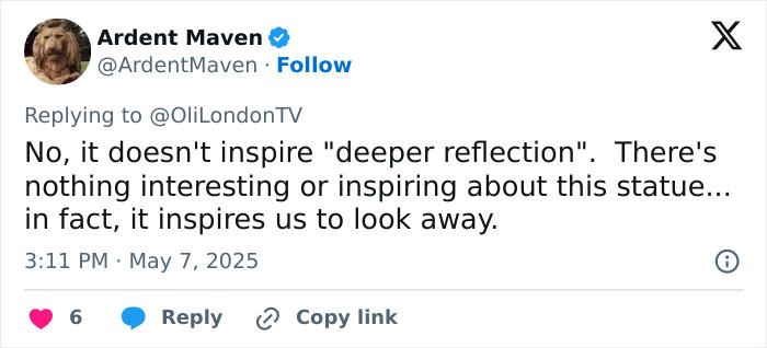 Twitter reply criticizing the statue of Black woman in NYC Times Square, sparking public debate and reflection.