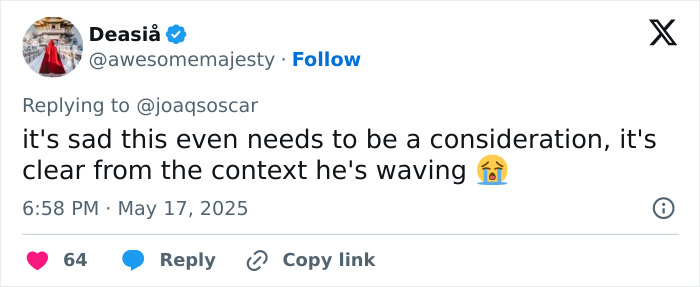 Tweet discussing Pedro Pascal's unintentionally offensive hand wave decoded by lip reader after interaction with Joaquin Phoenix.