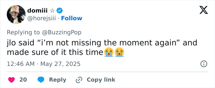 Screenshot of a tweet discussing Jennifer Lopez getting brutally roasted for a lesbian kiss at the AMAs, with crying emojis.