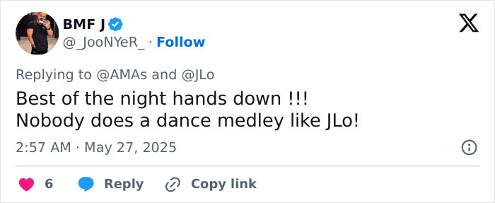 Tweet praising Jennifer Lopez's dance medley at the AMAs, highlighting her performance amid controversy over a lesbian kiss.