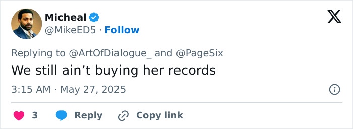Tweet by Micheal reacting to Jennifer Lopez's AMA performance, expressing skepticism about buying her records after the lesbian kiss controversy.