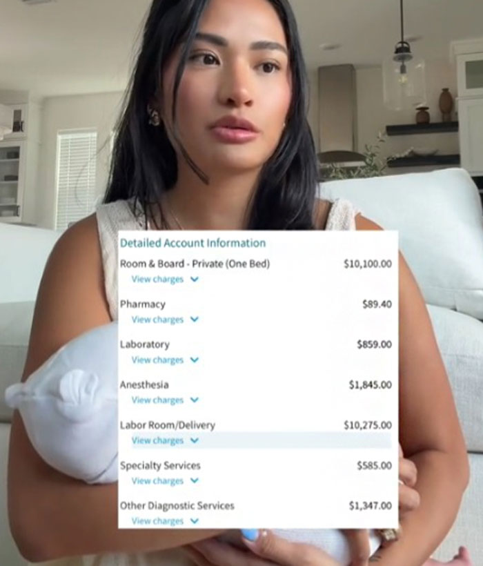 New mom holding baby with hospital bill showing high cost of giving birth in the US including delivery and anesthesia fees.