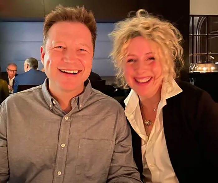 Hallmark actor smiling with a woman in a dimly lit restaurant before Vancouver attack news emerged