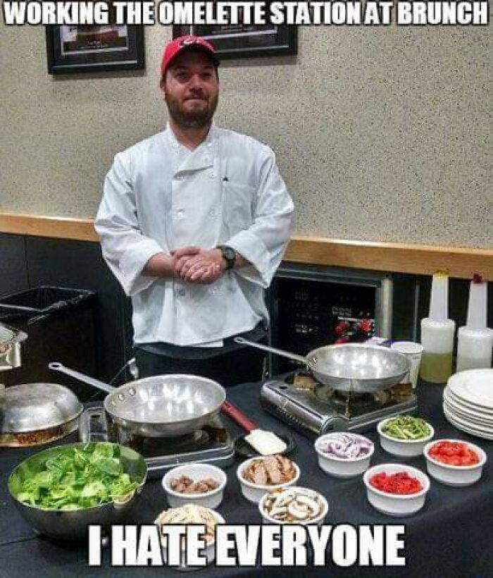 Man in chef coat and red cap standing at omelette station with ingredients, showing relatable hospitality work frustration.