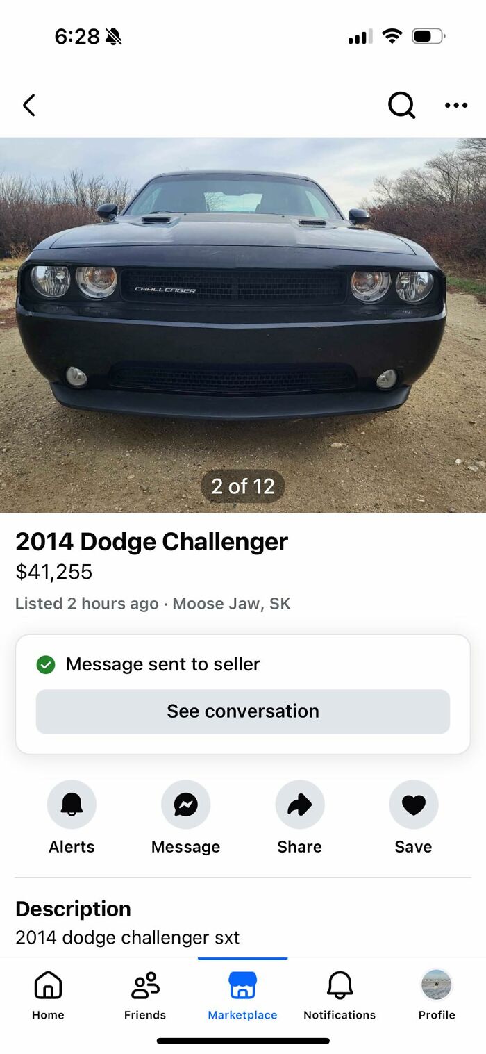 Front view of a 2014 Dodge Challenger listed for sale on Facebook Marketplace in Moose Jaw, SK.