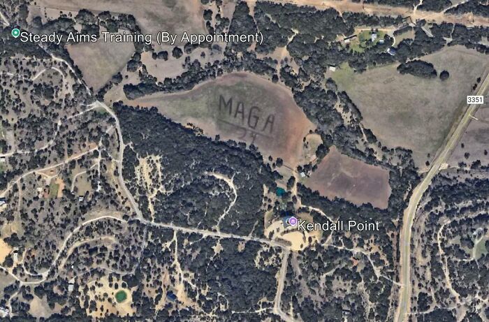 Aerial view showing a large "MAGA" message on a field, an odd thing found on Google Earth.