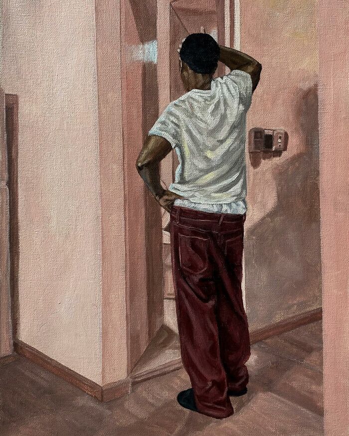 Painting of a man in casual clothes standing in a corner, exploring colours, space, and identity in a minimalist interior setting.