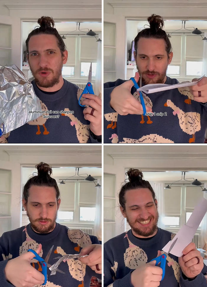 Man demonstrating how to sharpen scissors using aluminum foil while holding scissors and foil in a bright room.