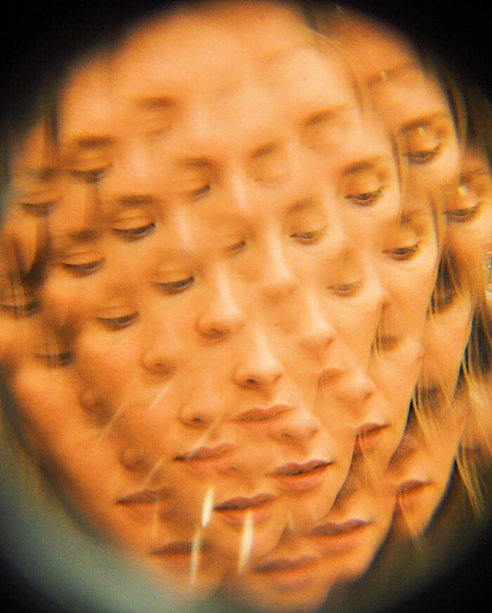 Multiple overlapping faces of a woman creating a surreal effect in creative photo edits that challenge perception and reality.