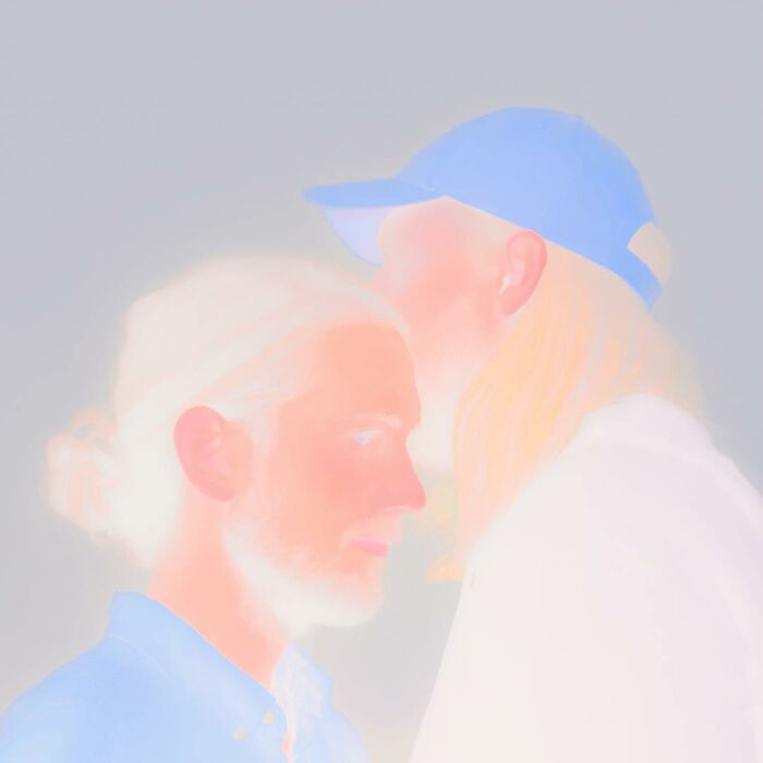 Two people in a surreal, soft-focus photo edit demonstrating creative visual lies that question reality.