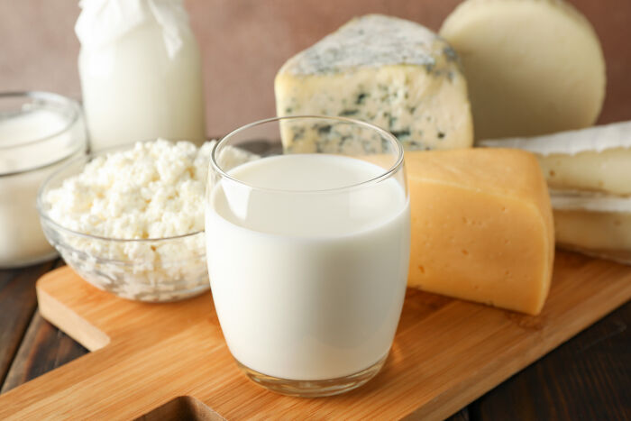 Various dairy products including milk, cheese, and cottage cheese, highlighting products requiring extra caution while cooking and eating.
