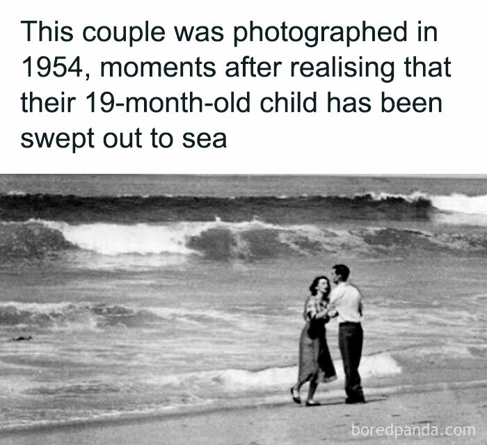 Black and white photo of a couple on a beach in 1954, capturing a disturbing and unsettling event that actually happened.