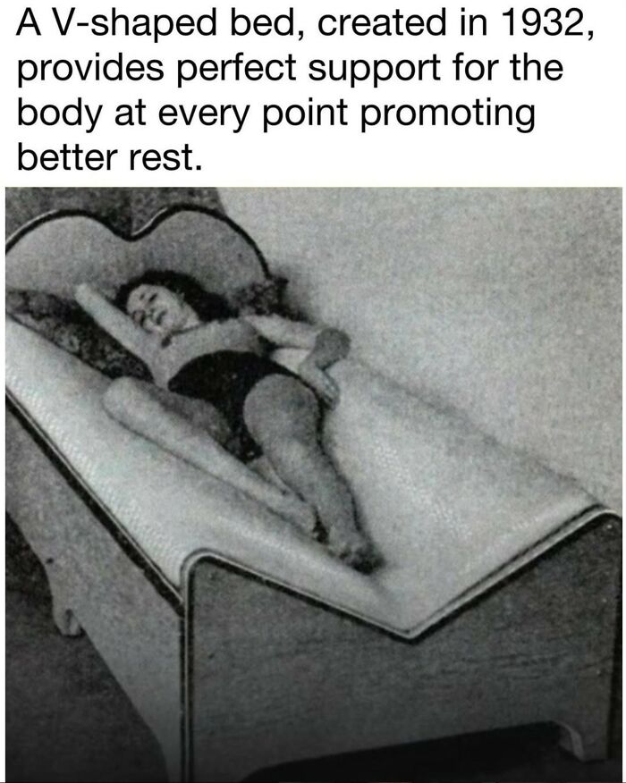 Vintage black and white photo of a woman lying on a V-shaped bed designed for better rest and body support.
