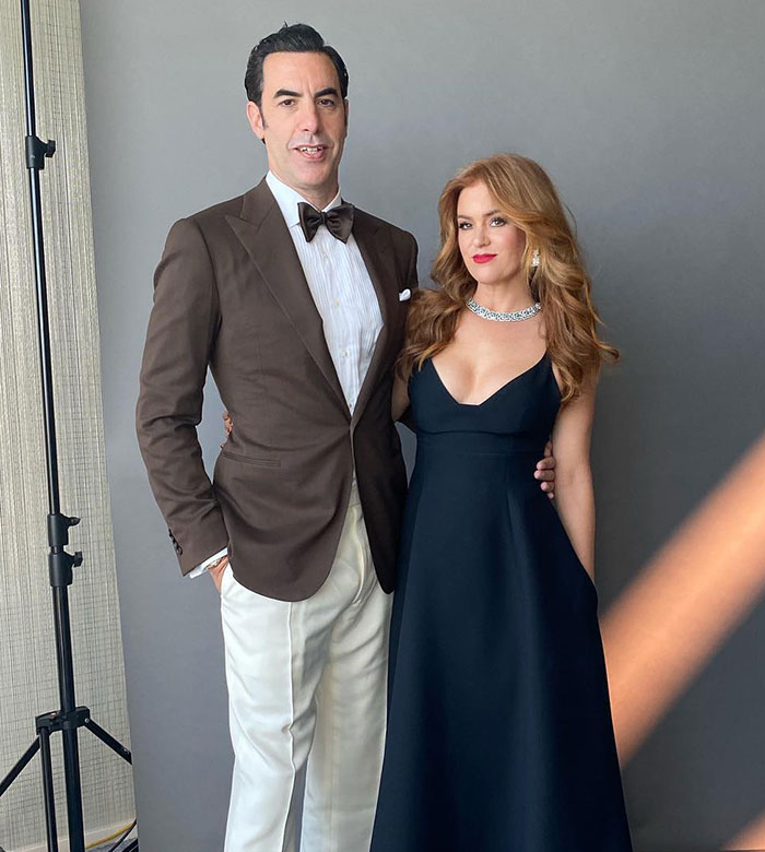 Isla Fisher and Sacha Baron Cohen posing together amid growing tension over $119 million divorce. Isla Fisher and Sacha Baron Cohen posing together amid growing tension over $119 million divorce.