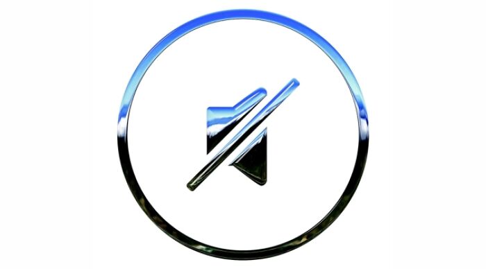 Muted speaker icon in a shiny metallic circle representing the concept of silent letters in everyday words. Muted speaker icon in a shiny metallic circle representing the concept of silent letters in everyday words.