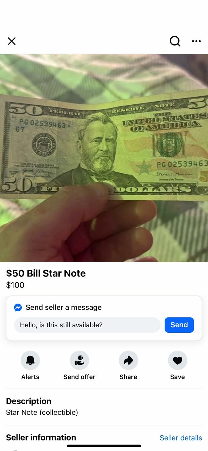 Hand holding a rare $50 star note banknote listed for sale on Facebook Marketplace among wildest finds.
