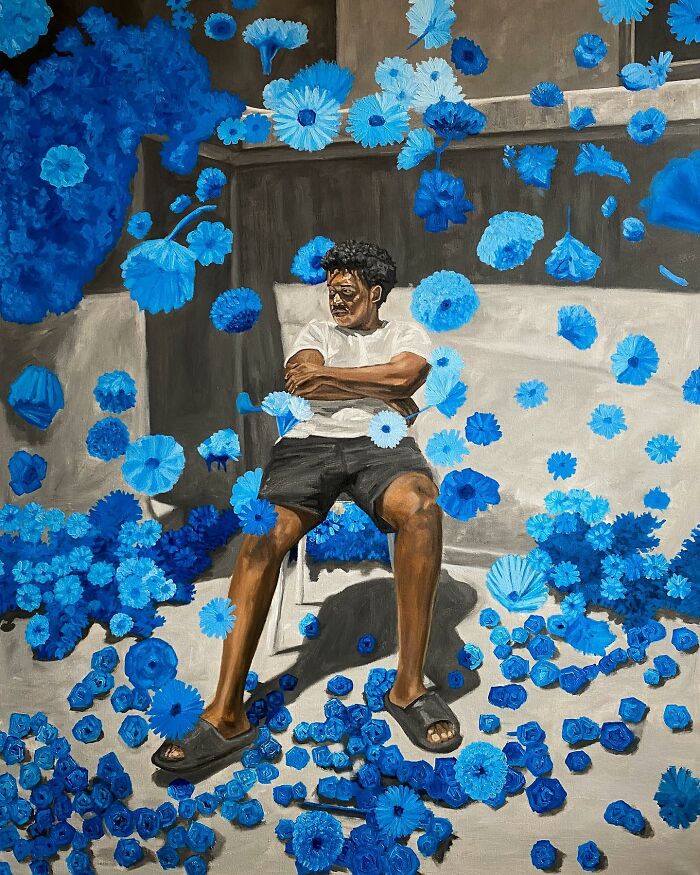 Man sitting amidst vibrant blue flowers in a surreal space, expressing colours, space, and identity in a modern painting.