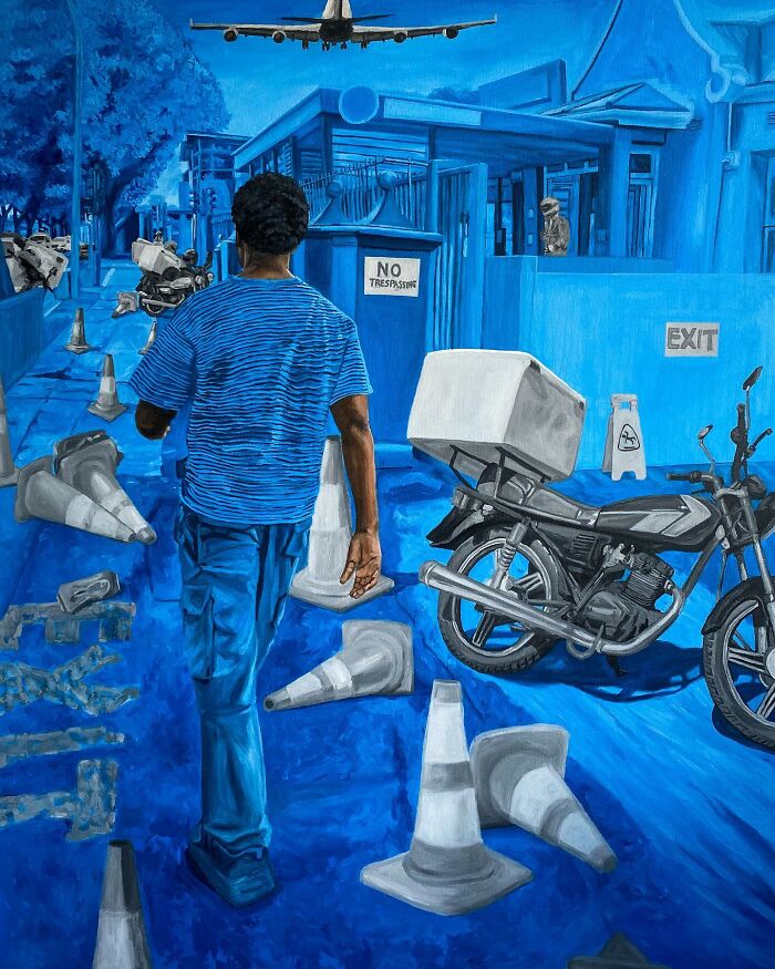 Man walking through blue-toned urban scene with cones, motorcycle, and plane overhead, exploring colours, space, and identity.