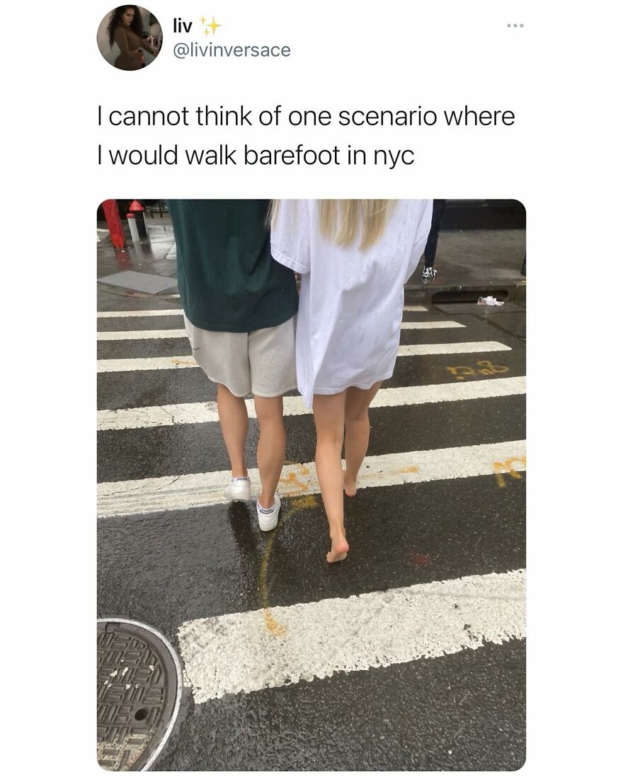 Person walking barefoot on wet NYC street crosswalk, illustrating humor in memes about inconvenience and meltdown moments.