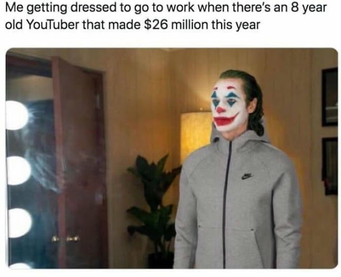 Person dressed as Joker wearing a gray Nike jacket, symbolizing the struggle in vegan memes balancing on the brink of being offensive.
