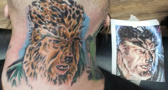 Tattoo of a werewolf face on the back of a person's neck showing a permanent inked mistake compared to the reference image.