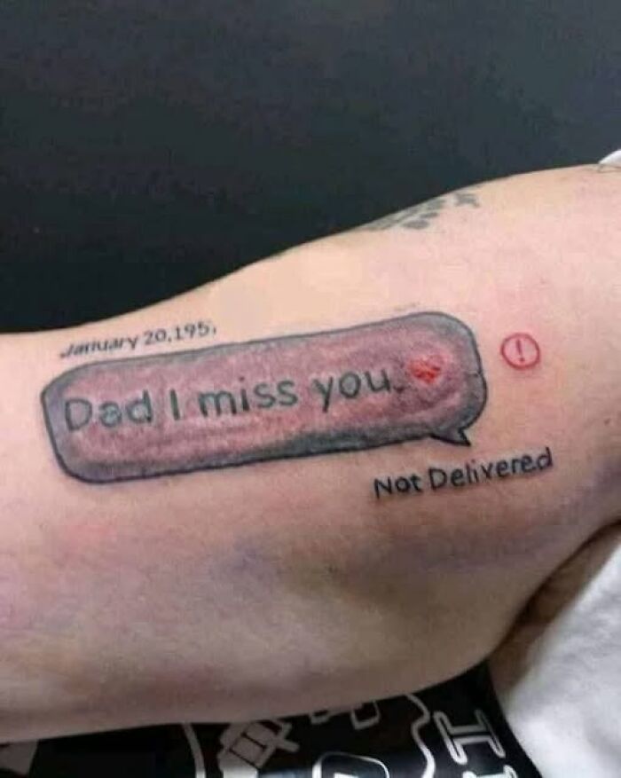 Arm tattoo of a text message bubble saying Dad I miss you with a not delivered error symbol, showing a permanent mistake inked.