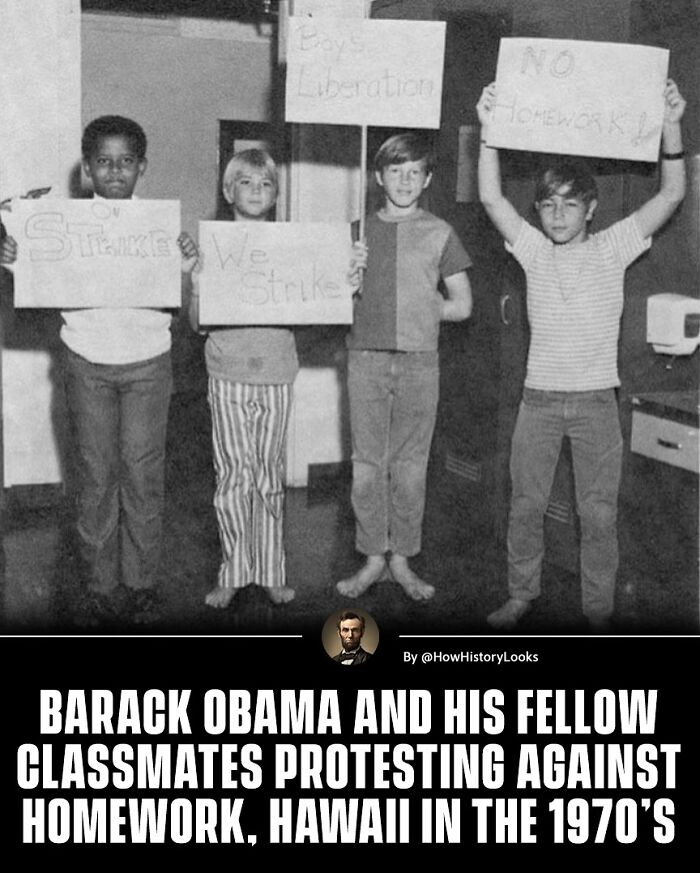 Four children holding protest signs about homework in 1970s Hawaii, a monumental life moment frozen in time.