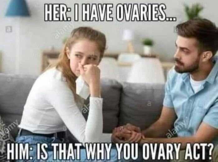 A woman looking upset while a man holds her hand, with a meme about ovaries and wordplay, related to vegan memes.