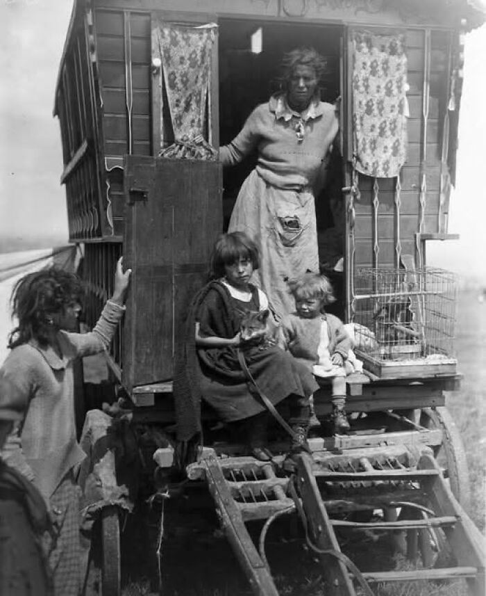 Woman and children outside a wagon in antique historical photographs showing life from the past.