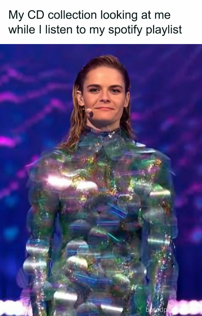 Performer wearing a shimmering iridescent outfit on stage during the 2025 Eurovision Song Contest performance.