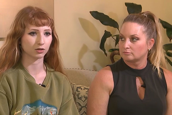 Teen girl and woman sitting indoors, discussing the controversy around a trans prom date at a Christian school.