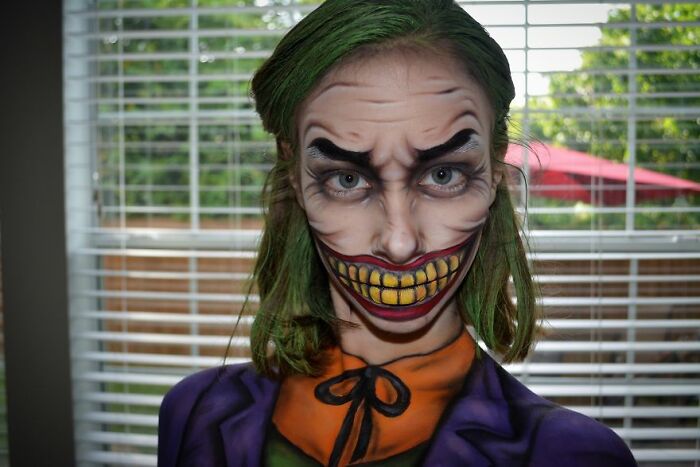 Creative makeup look featuring a Joker-inspired design showcasing talented artists' incredible makeup skills.