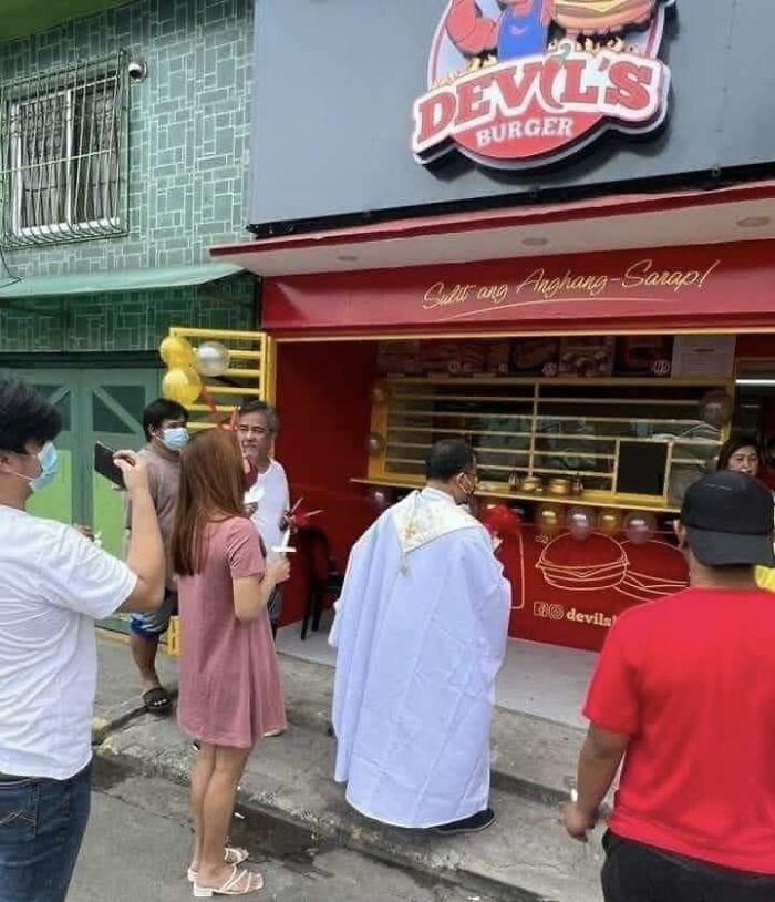 People gathered outside Devil’s Burger for a blessing ceremony, featuring funny posts and candid moments to share with friends.