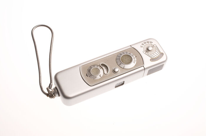 Vintage CIA spy technology device with dials and a wrist strap, showcasing ingenuity in covert surveillance tools.