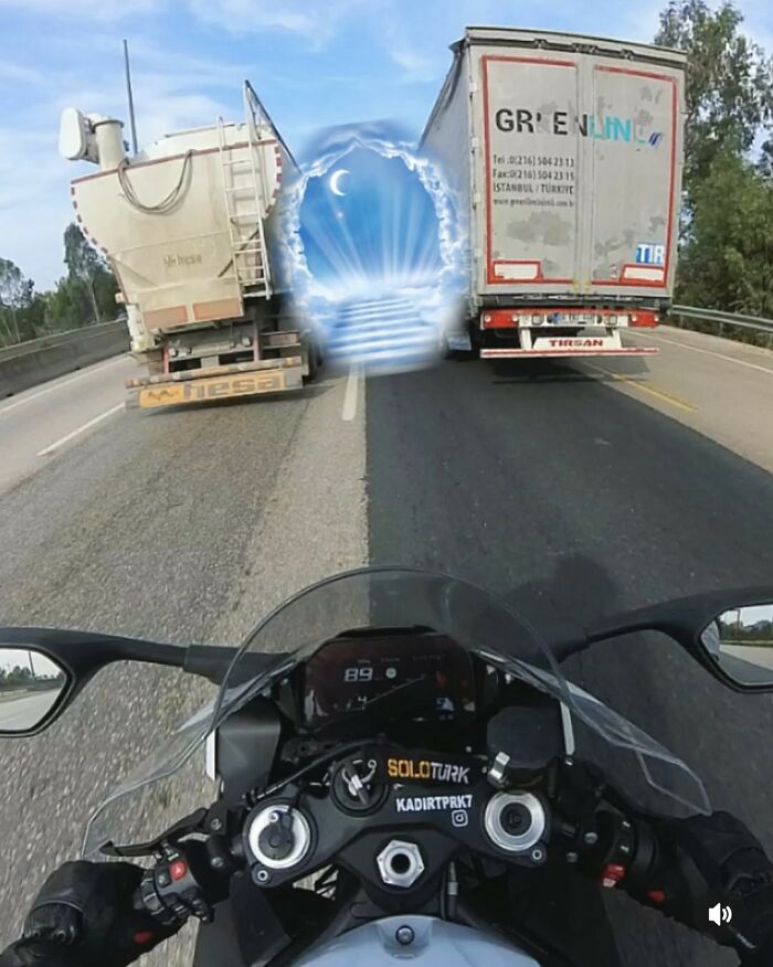 Motorcycle rider views two trucks on highway with a glowing portal between them, funny memes about hard days concept.