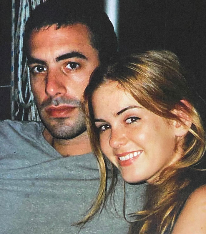 Isla Fisher and Sacha Baron Cohen close together in a dim setting amid growing tension over $119 million divorce. Isla Fisher and Sacha Baron Cohen close together in a dim setting amid growing tension over $119 million divorce.