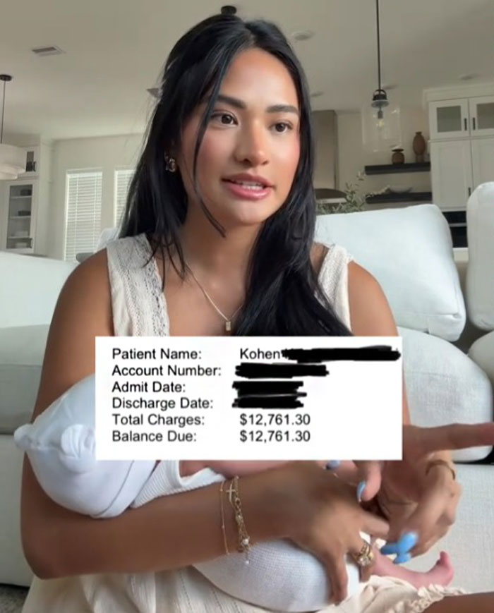 New mom holding baby boy discussing expensive birth costs and hospital bill totaling over twelve thousand dollars in the US.