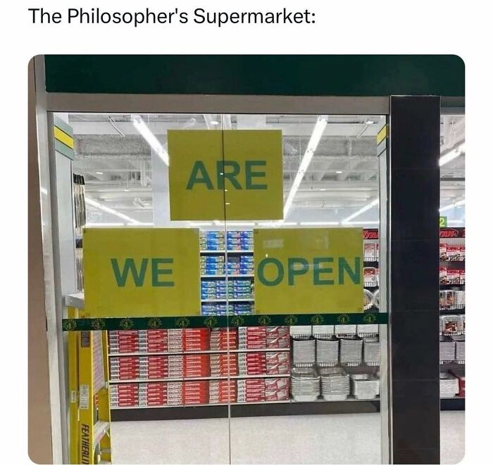 Funny meme showing a supermarket door with signs arranged as a philosophical question, part of funny memes collection.