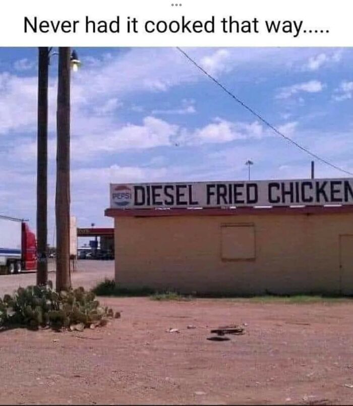 Sign on a building humorously reads diesel fried chicken, relating to hilariously relatable memes about working in hospitality.