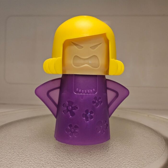 Angry purple and yellow kitchen timer toy with floral pattern, an affordable home find for easy life living.