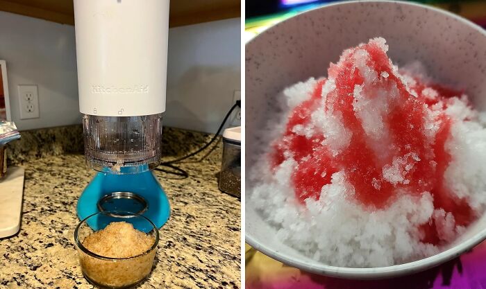 Electric shaved ice machine on kitchen counter next to a bowl of shaved ice with red syrup, summer essentials for heat wave.