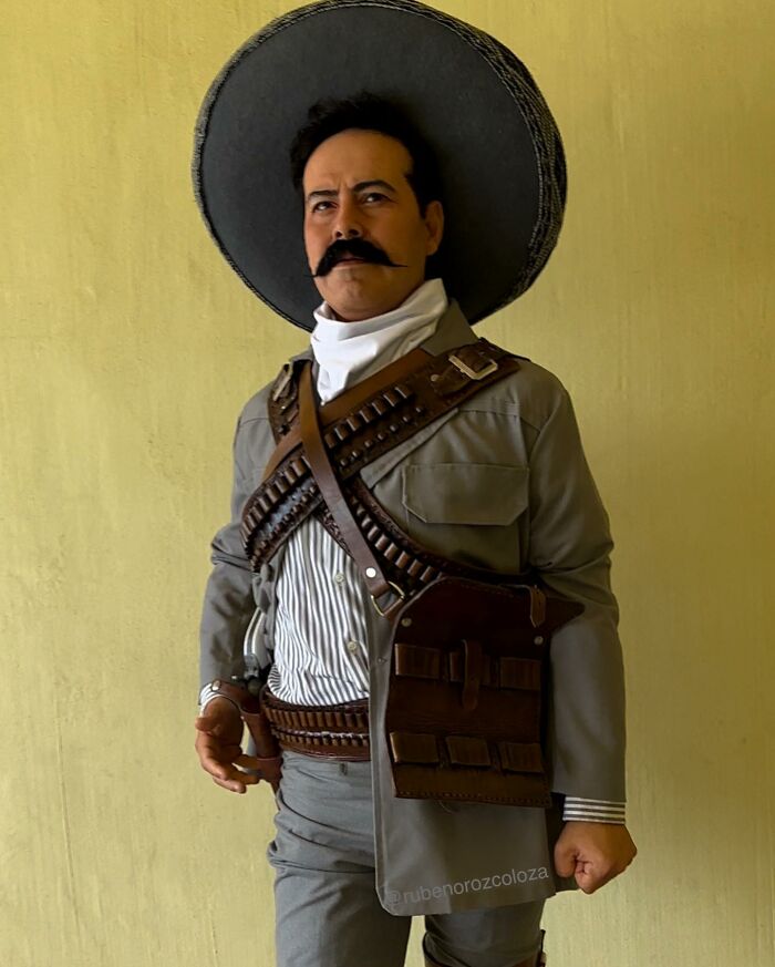 Hyper-realistic sculpture by Ruben Orozco Loza depicting a man in traditional Mexican revolutionary attire.