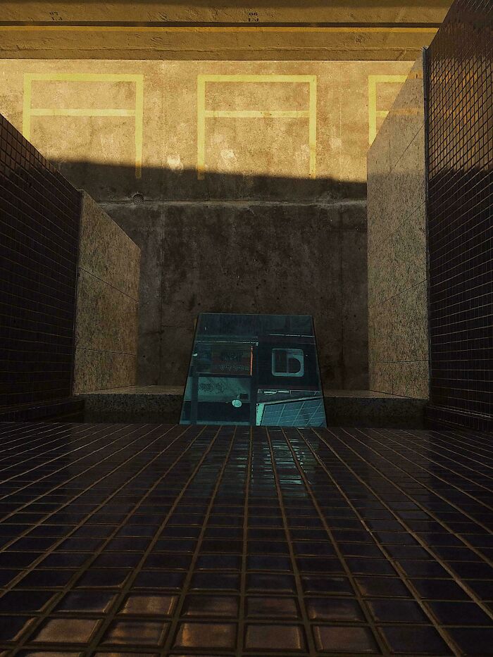 Alternate angle view of a building and parking lot featuring shadows and reflective glass in urban architecture.